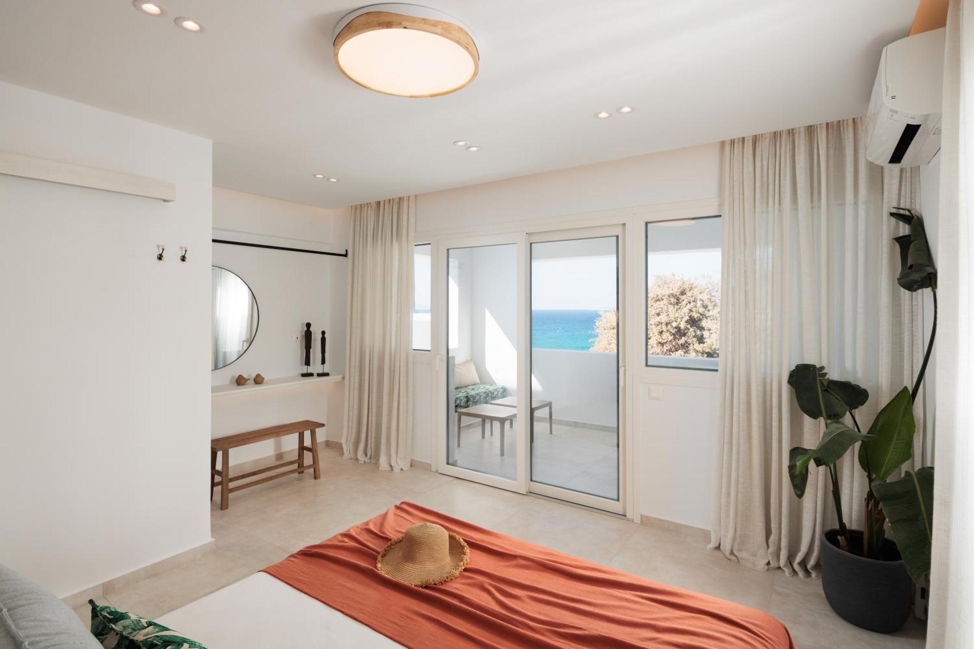Seanfinity Beachfront Suites Микри-Вигла Номер фото